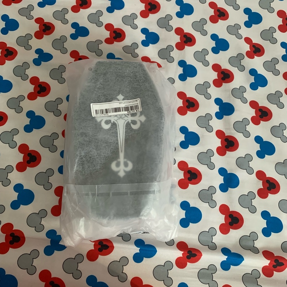 Black coffin purse with white cross